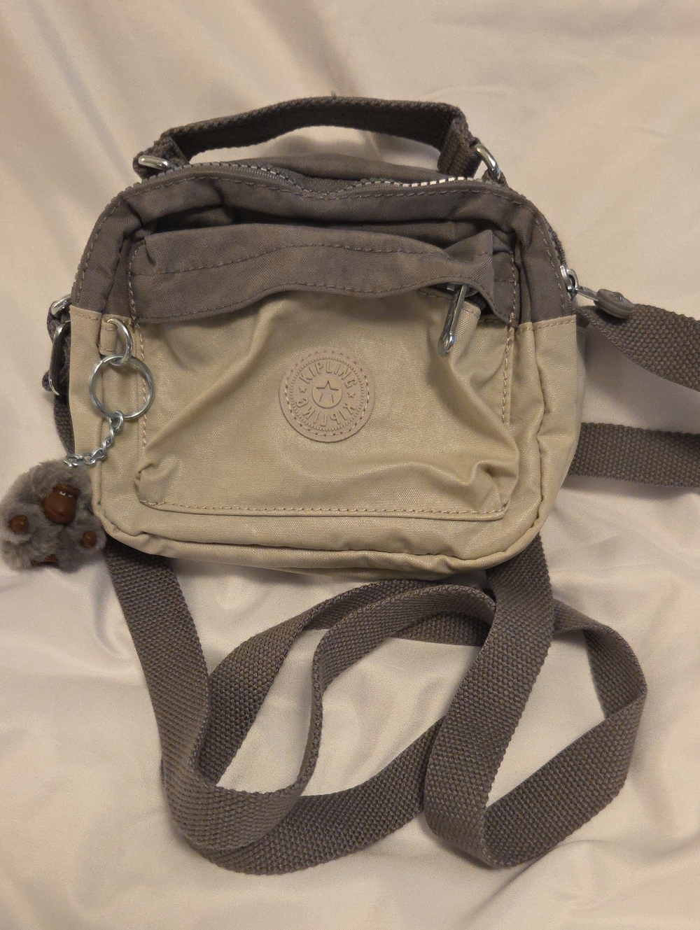 Kipling Two-Tone Beige and Taupe Crossbody Bag with Monkey Charm
